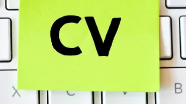 Sticky note with 'CV' on keyboard keys.