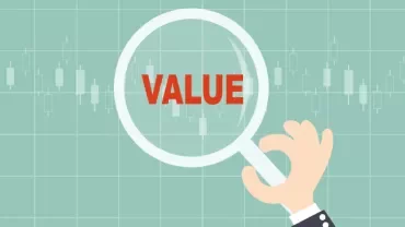 Magnifying glass highlighting the word 'value' over a stock chart.