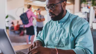 A man working on his laptop