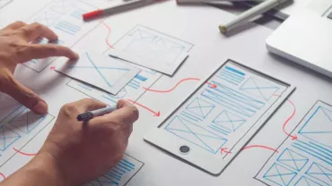 Two hands drawing graphs