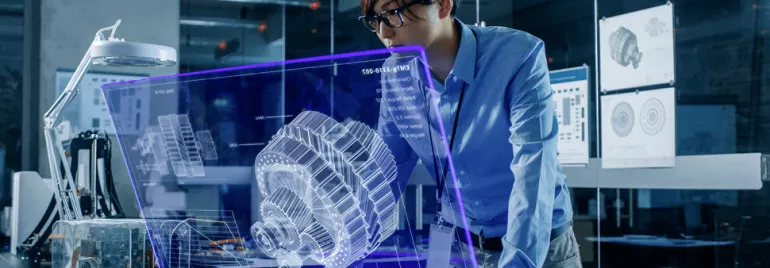 Engineer examining holographic motor design in a tech lab.