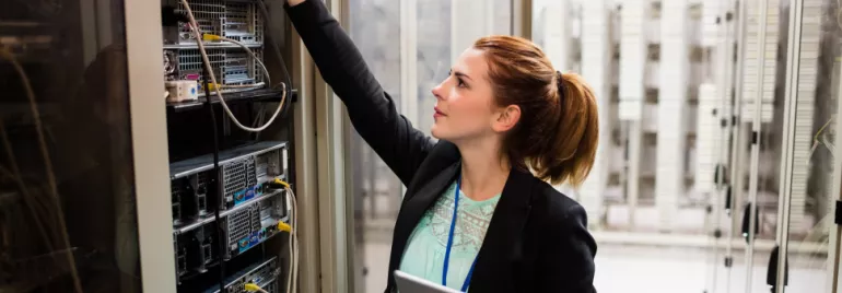 Woman checking technical equipment