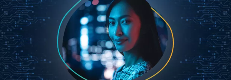 Woman in a tech-themed setting with blue and red lighting.