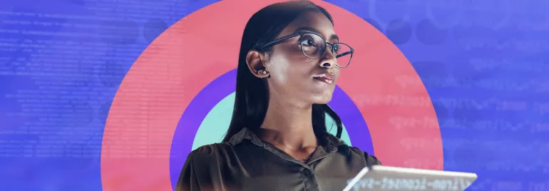Person with glasses using a tablet, coding background.
