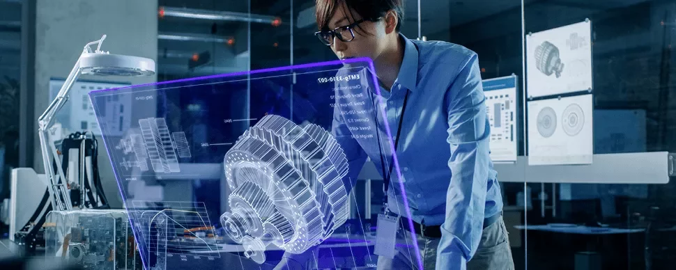 Engineer examining holographic motor design in a tech lab.
