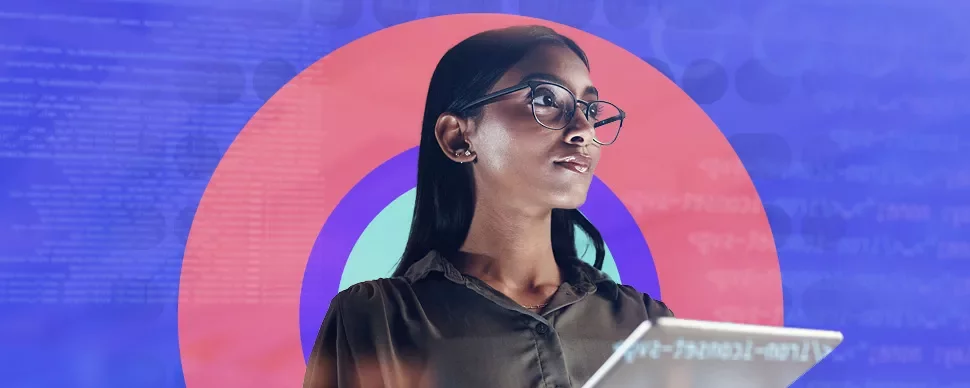 Person with glasses using a tablet, coding background.